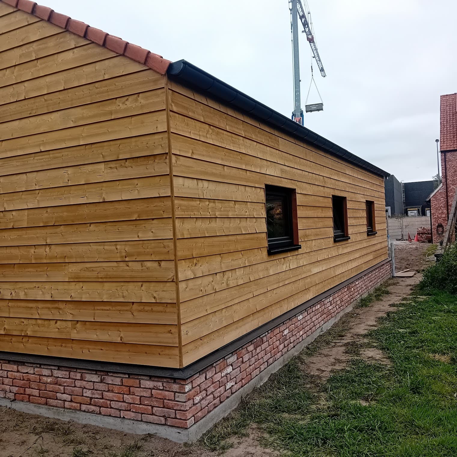 Houten gevelbekleding bijgebouw